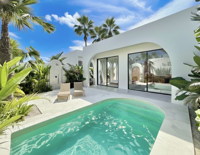 The Young Villas: Luxury tropical-modern rentals in Uluwatu, Bali, featuring a sleek pool and lush t.