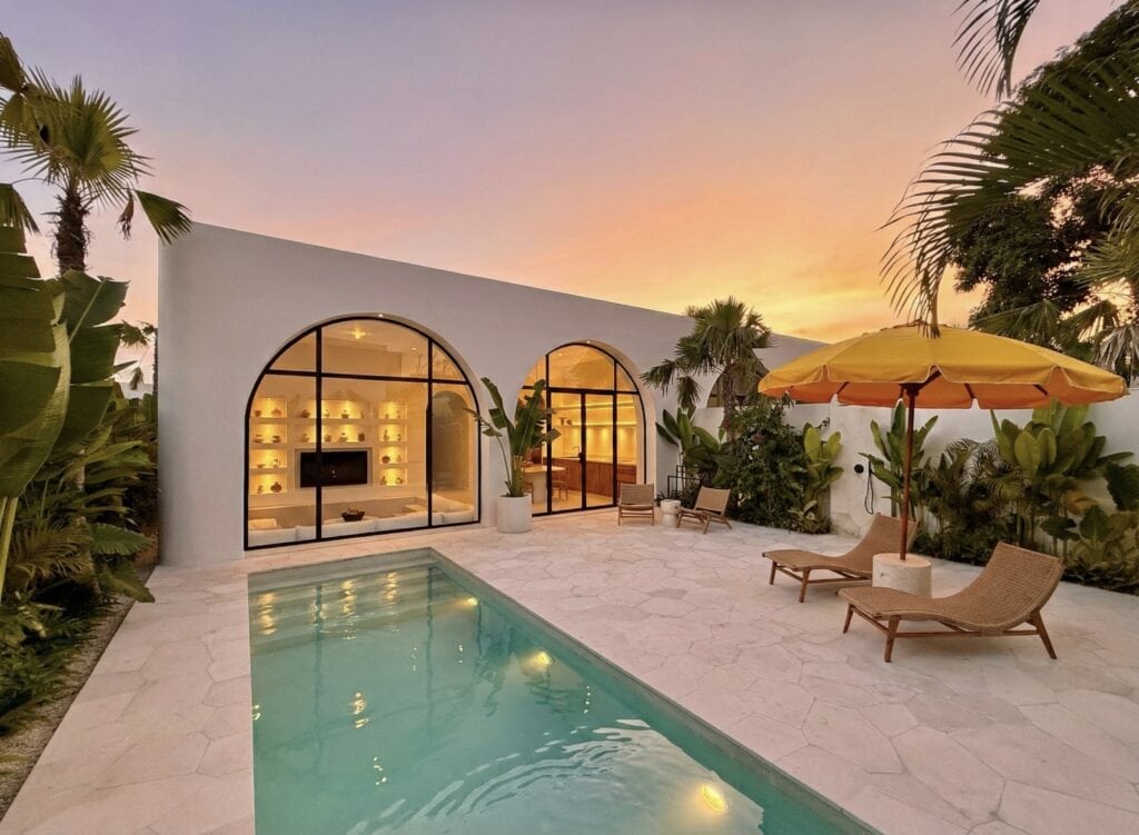 Modern villa with pool and outdoor lounge in Uluwatu, Bali.