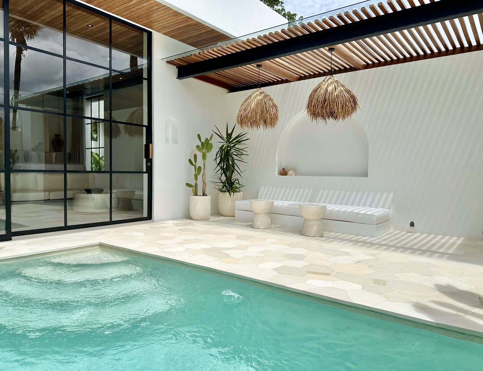 Modern Bali villa with pool, white decor, and tropical accents in Bingin, Uluwatu.