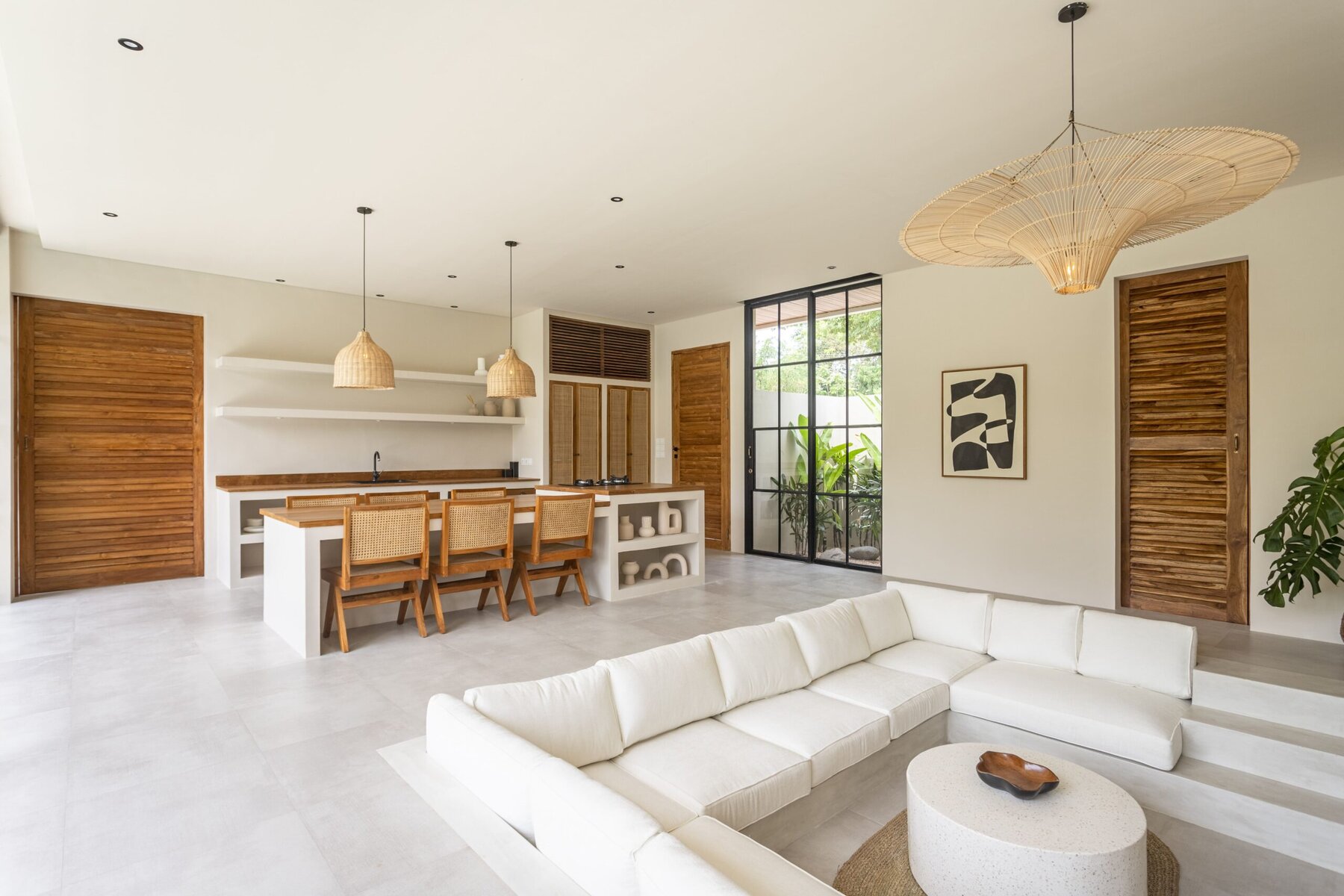 Bright, modern Bali villa living space with natural wood accents and minimalist decor.