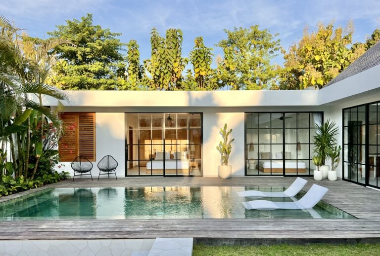 Modern minimalist villa with private pool and lush garden, located in the exclusive Uluwatu region of Bali.