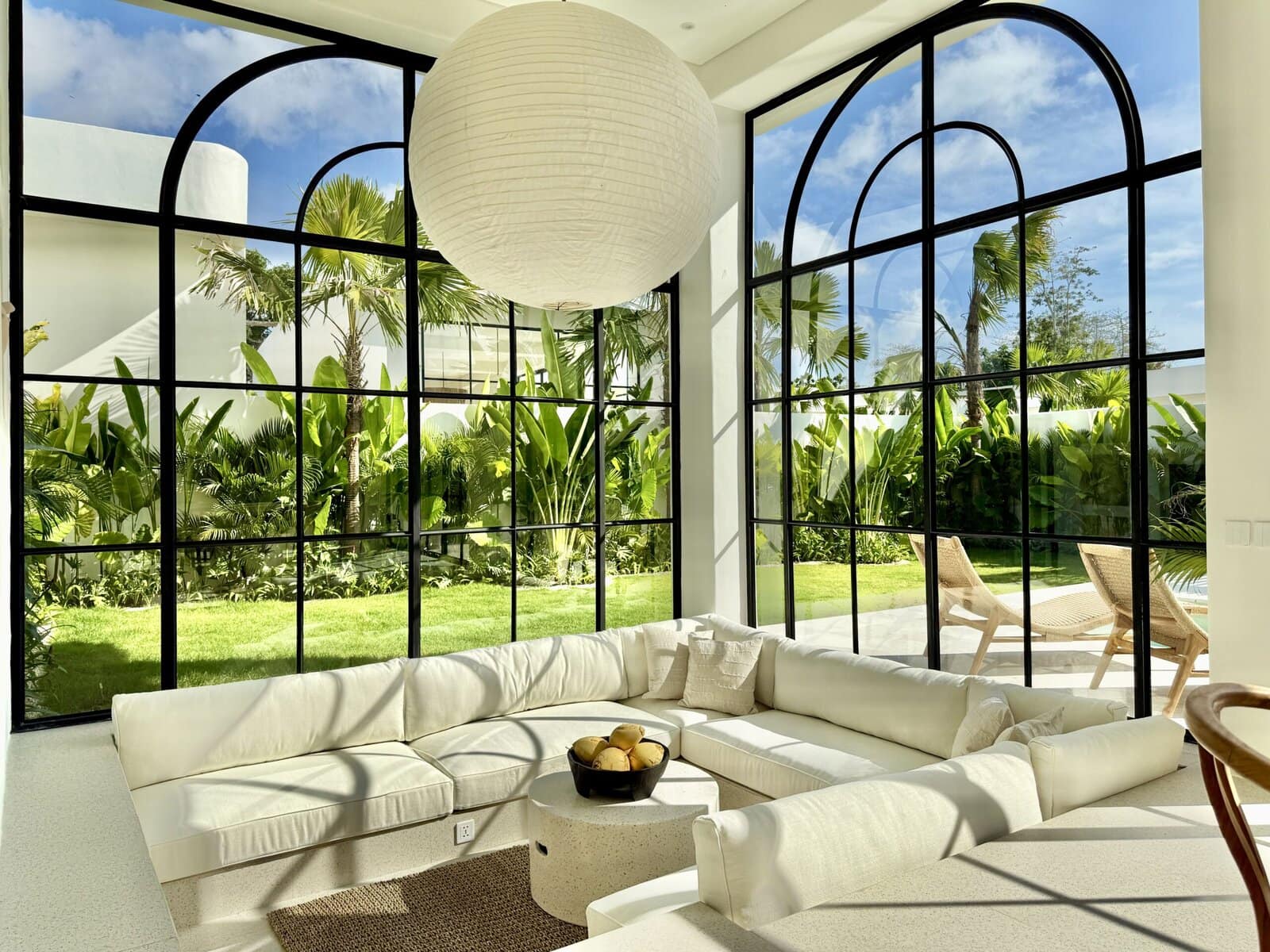 Bright, modern Bali villa with lush garden views and minimalist decor.
