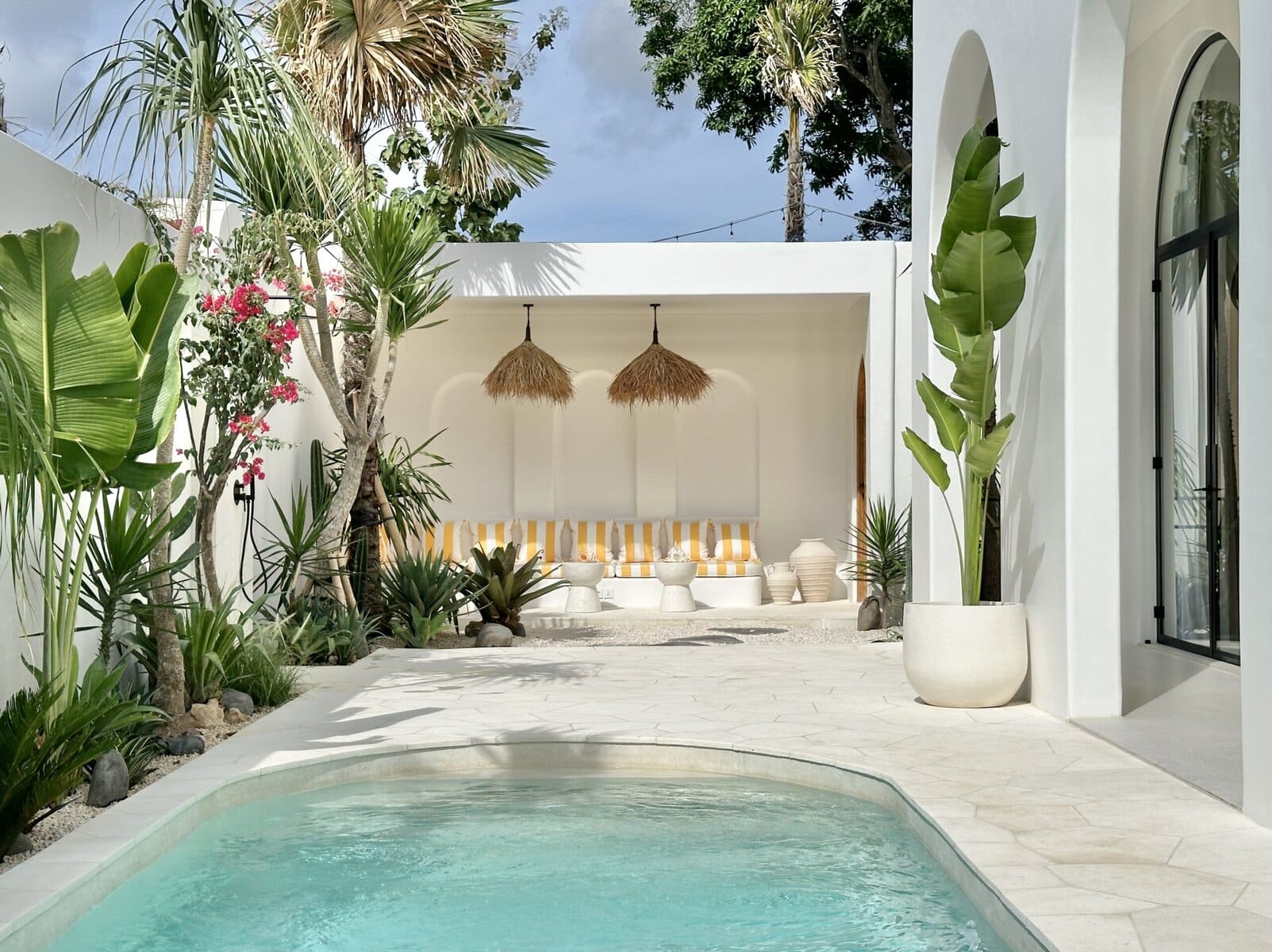 Stunning two-bedroom villa with private pool and tropical-modern decor in Uluwatu, Bali. Ideal for a relaxing getaway.