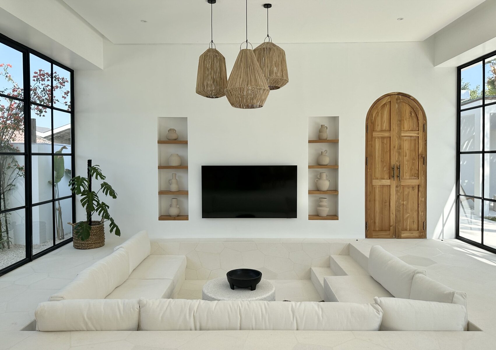 Bright, open living space with stylish furniture and Bali-inspired design elements.