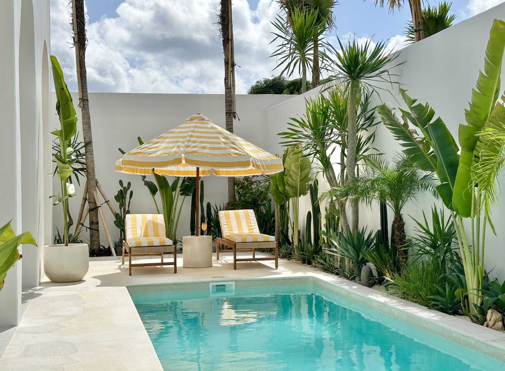 Modern Bali villa with private pool and tropical garden views. Perfect for a relaxing getaway.