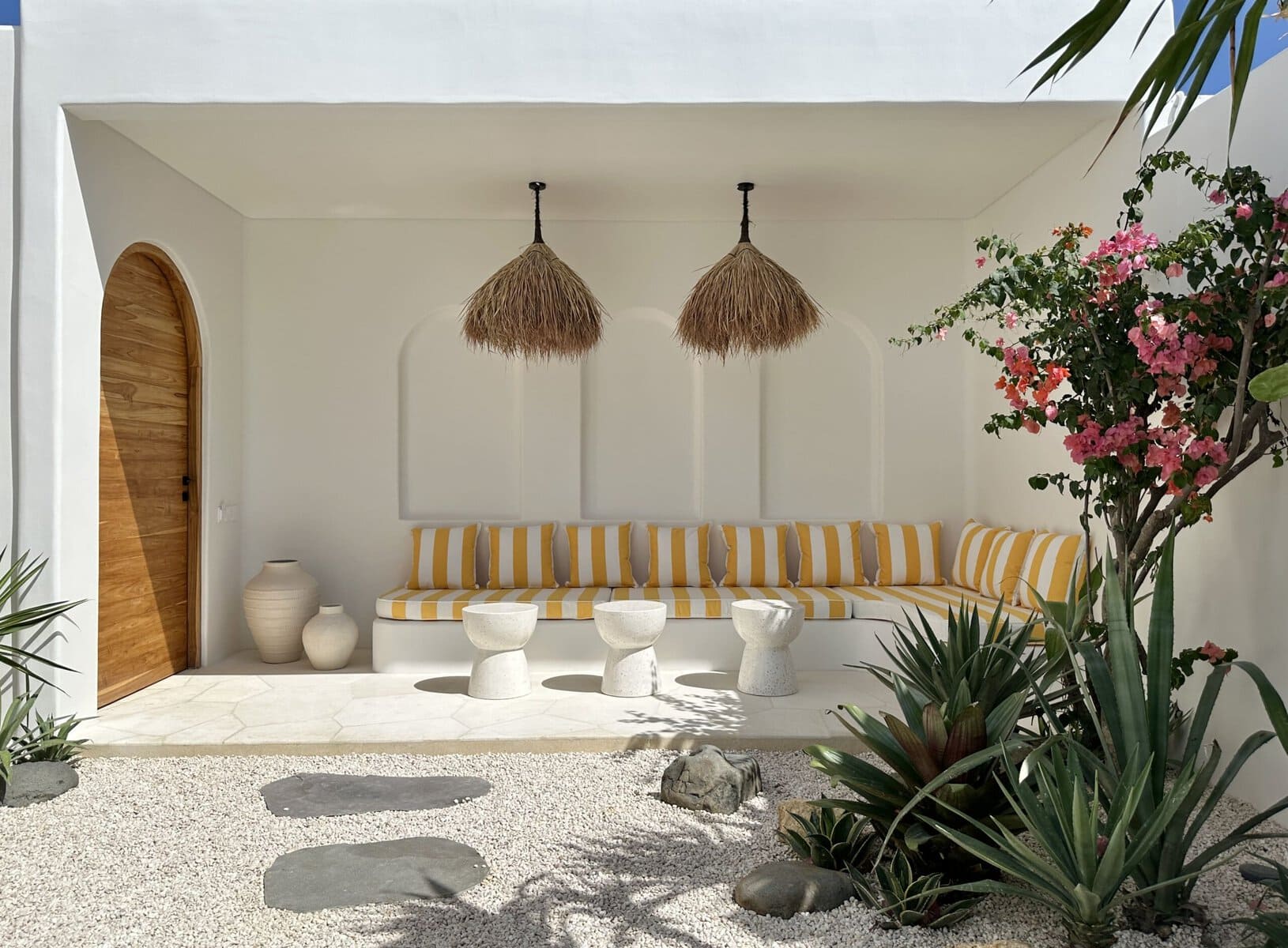 Stunning modern Uluwatu villa featuring minimalist design and lush garden accents.