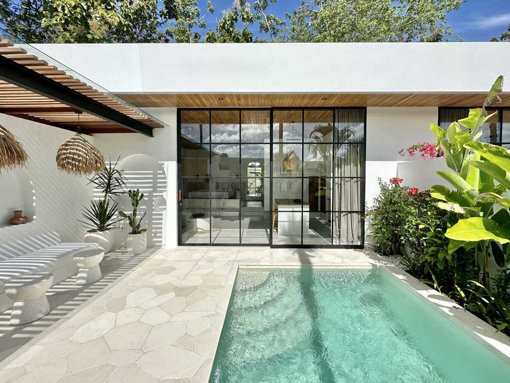 High-end Bali villa featuring a swimming pool and sleek modern design in Bingin, Uluwatu. Ideal for a luxurious vacation.