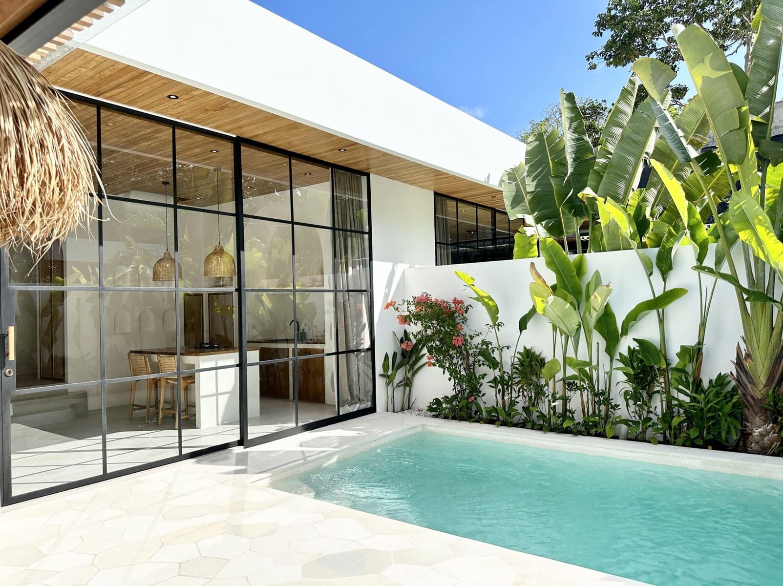 High-end modern Bali villa with private pool, lush garden, and sleek minimal design, perfect for relaxation.