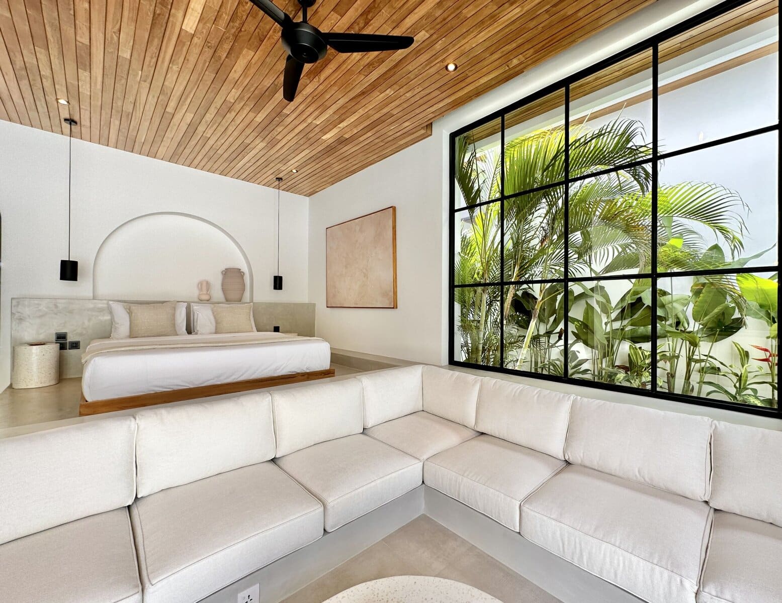 Modern Bali villa with tropical decor and panoramic jungle scenery.
