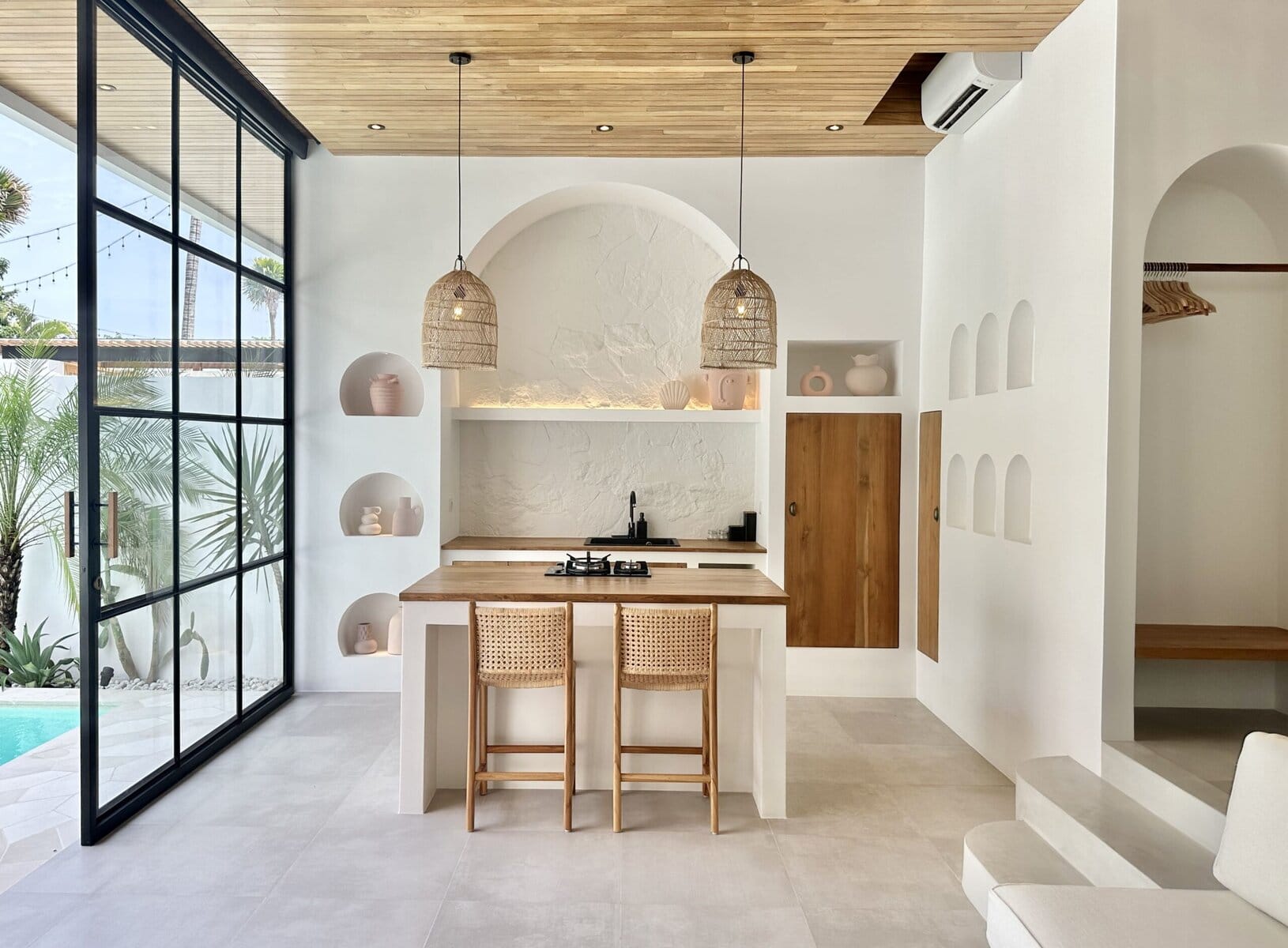 Bright, airy Bali villa with modern minimalist design and natural lighting.