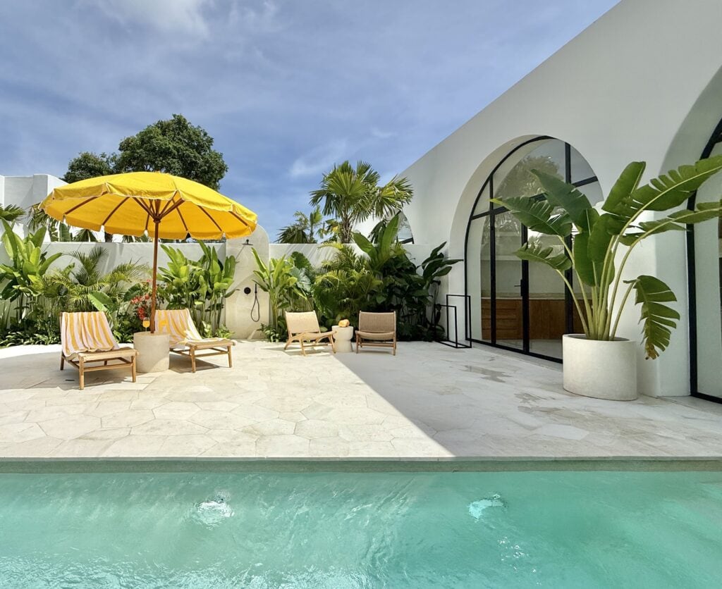 Bright outdoor space with modern design and tropical greenery in Bali.