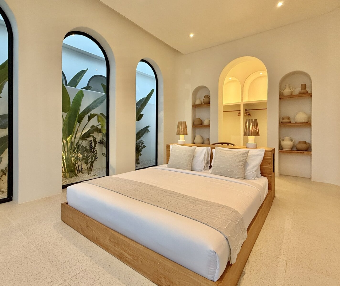 Luxurious one-bedroom villa in Uluwatu featuring minimalist design, natural tones, and elegant lighting.
