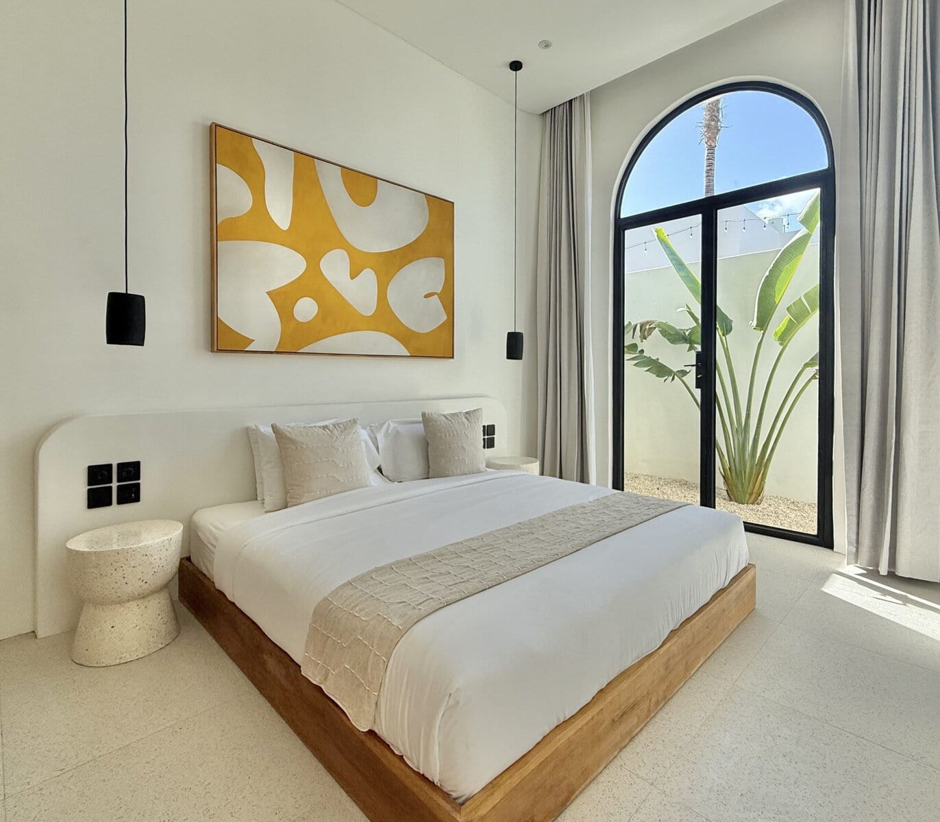 Experience high-end tropical-modern design with elegant decor in a spacious Uluwatu villa.