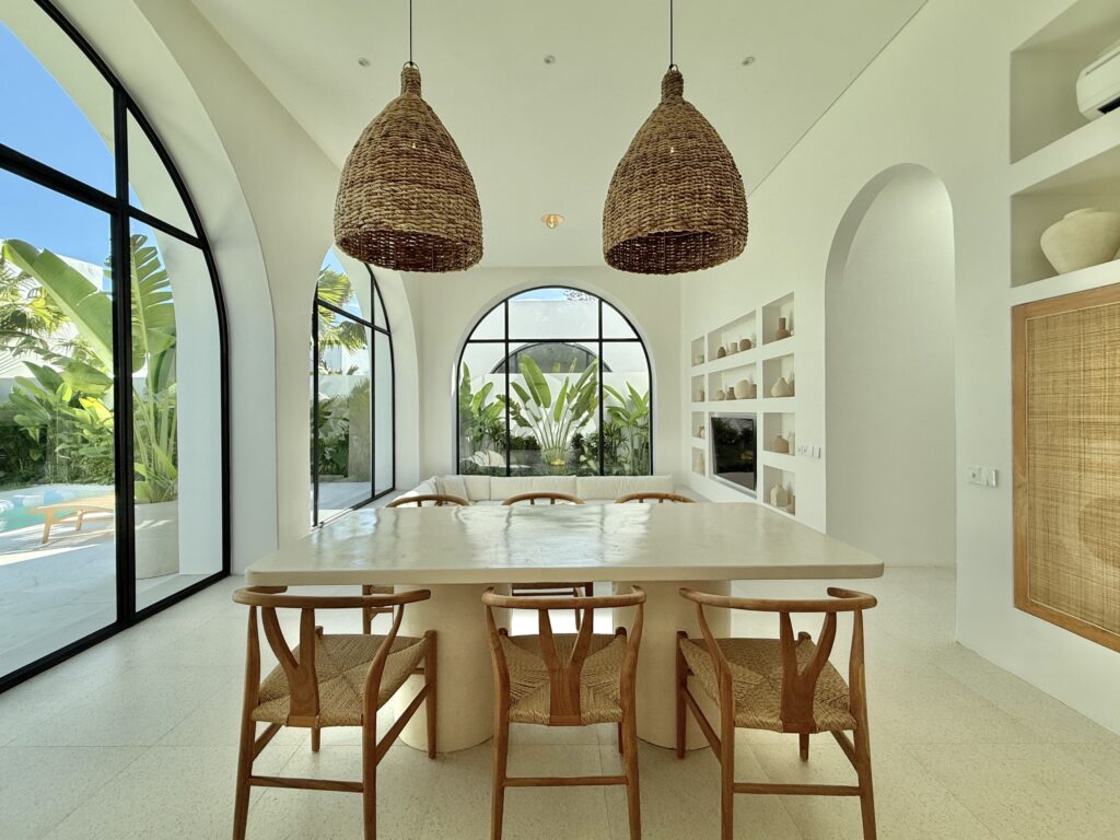 Bright, modern villa with spacious dining area and tropical decor in Uluwatu, Bali.