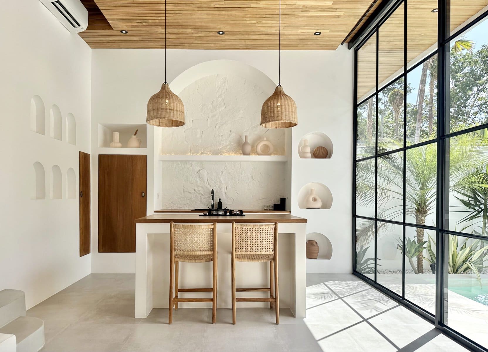 Bright, airy one-bedroom villa with modern minimalism, lush outdoor views, perfect for tropical relaxation.