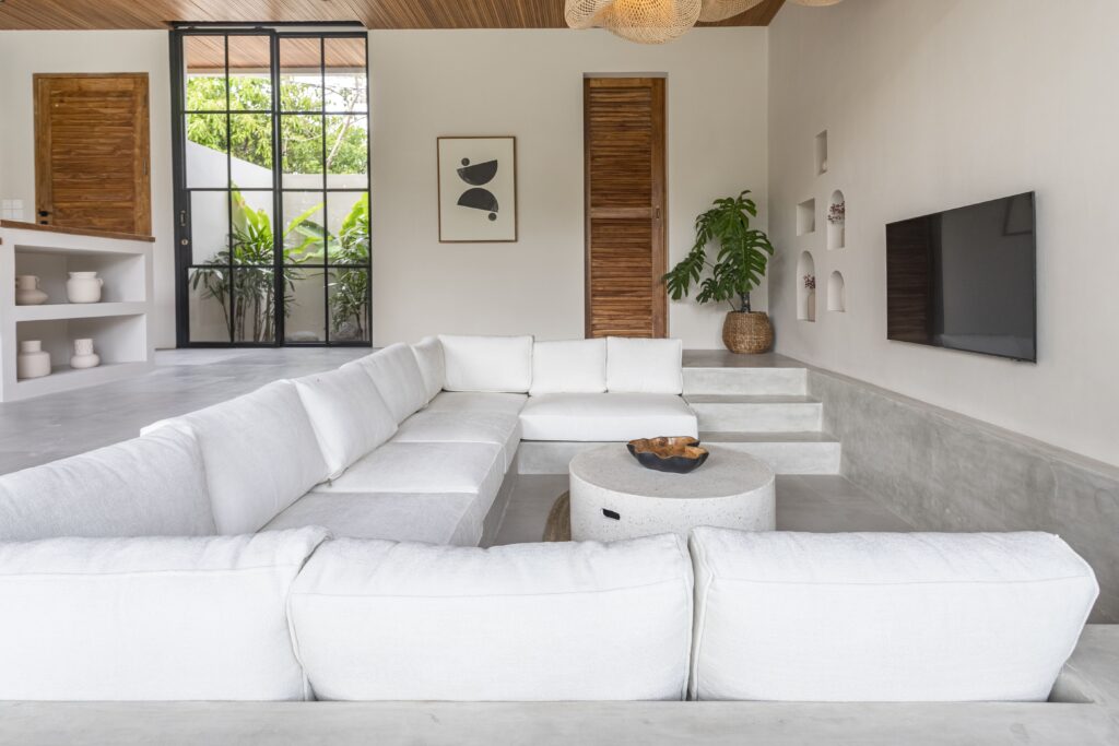 Stylish tropical-modern living room with minimalist decor in Bali.