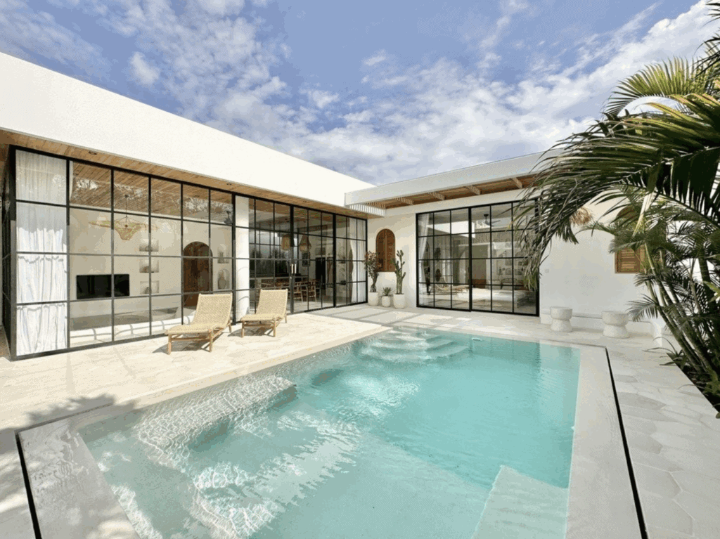 A stunning Bali villa featuring a private pool, sleek modern design, and tropical decor in Uluwatu's sought-after area.