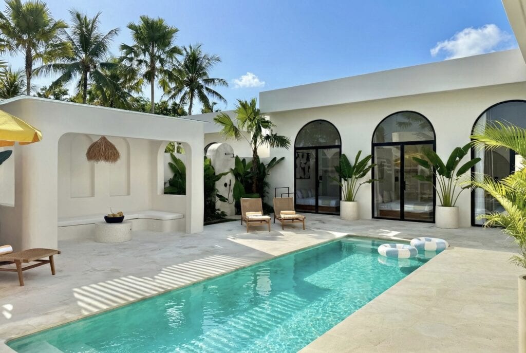 Stylish modern villa featuring a private pool and lush tropical surroundings in Uluwatu.