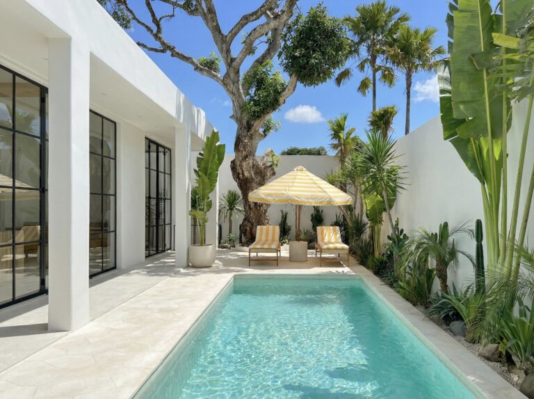 The Young Villas: Luxurious tropical-modern villa with private pool surrounded by lush greenery in U.