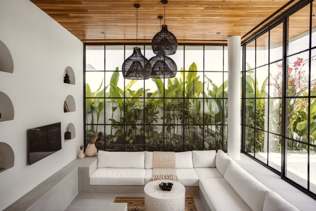 Modern Bali villa with tropical accents, bright natural light, and stylish furnishings.