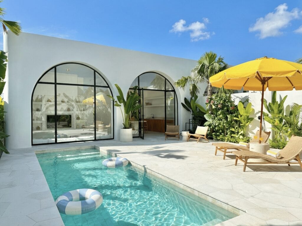 The Young Villas: Elegant tropical-modern villa with private pool and lush greenery in Uluwatu, Bali.