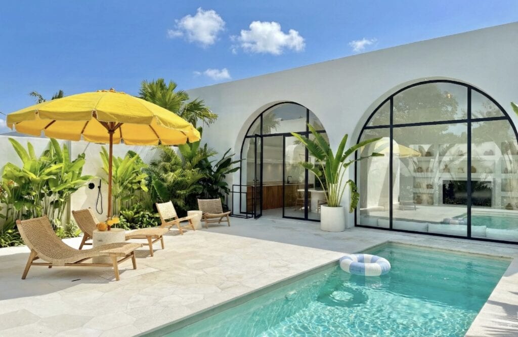 Bright and airy summer vacation home featuring a sparkling plunge pool.