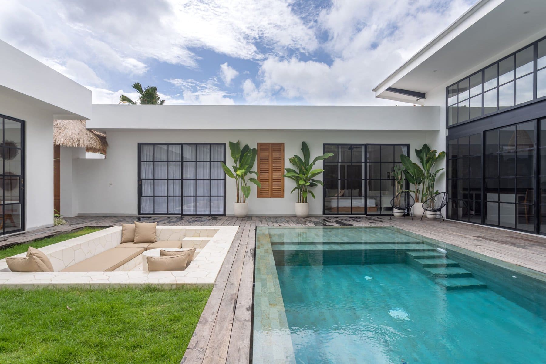 Stunning four-bedroom villa in Uluwatu featuring a private pool, modern design, and tropical surroundings.