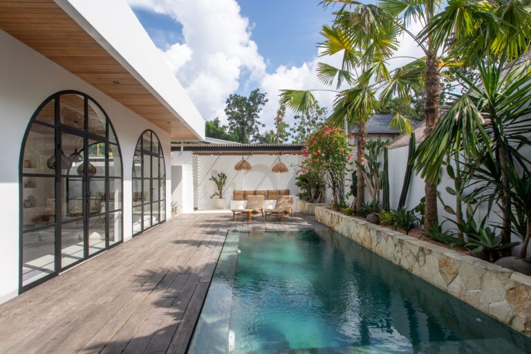 Stunning two-bedroom Uluwatu villa with private pool, modern minimal design, lush tropical landscaping, perfect for a relaxing getaway.