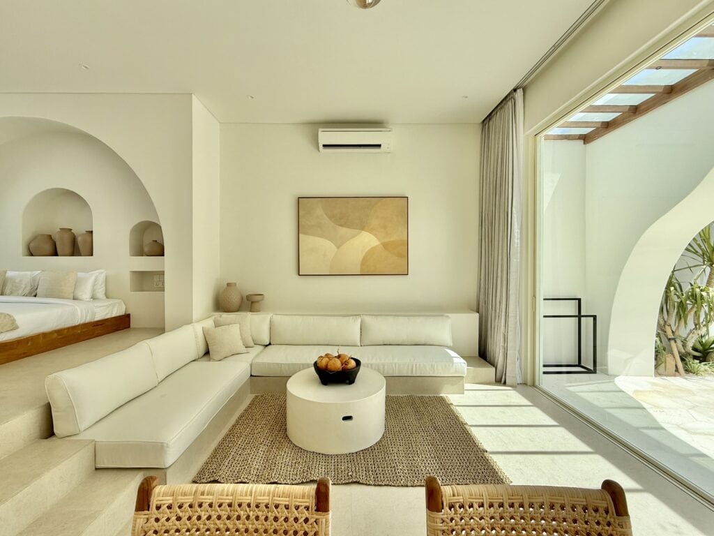 Bright and modern living space with minimalist decor, neutral tones, and natural light.