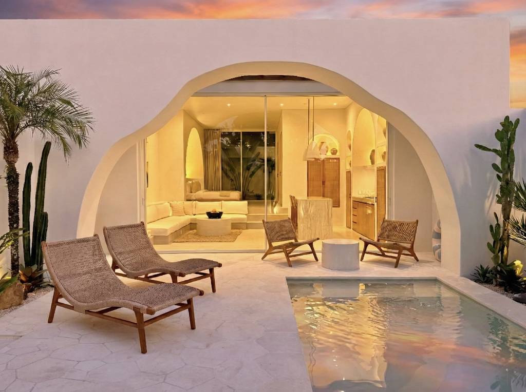 The Young Villas: Luxurious tropical-modern villa with archway entrance and private pool in Uluwatu,.